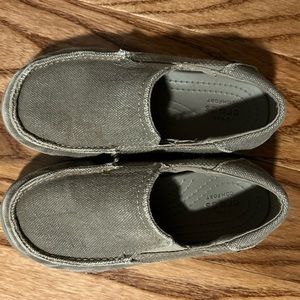 Crocs canvas slip-on shoe. Size 11 toddler boy. Great gently used condition.